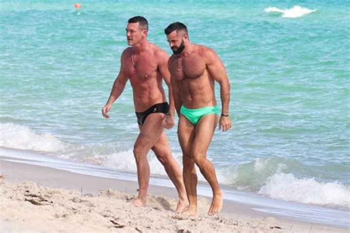 Luke Evans and Boyfriend Fran Tomas Hit the Miami Shore in Speedos After Red Carpet Debut as Couple