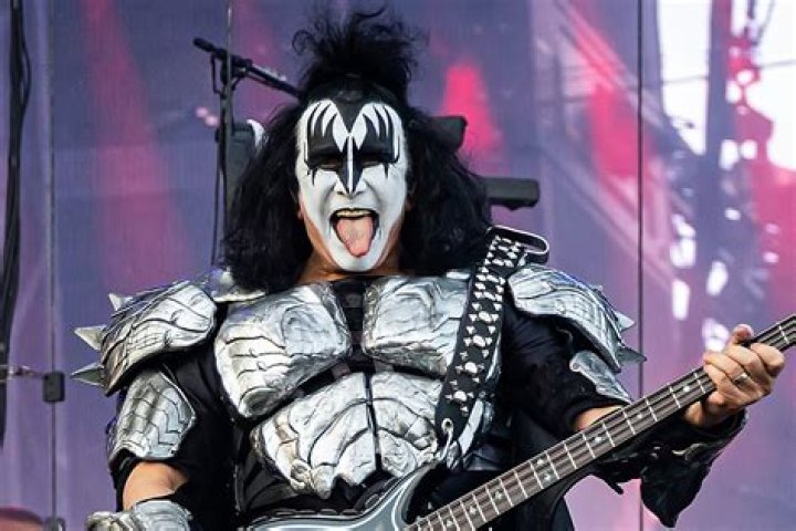 What degree does Gene Simmons have? What instrument did Gene Simmons play?